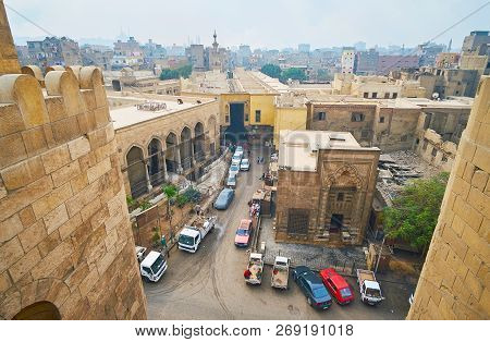 Cairo, Egypt - December 21, 2017: The View From Bab Zuwayla Gate On Al Khayama Street With Tentmaker