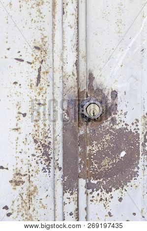 Old Rusty Lock, Detail Of A Lockable Metal Wall, Neglect And Dirt, Debris