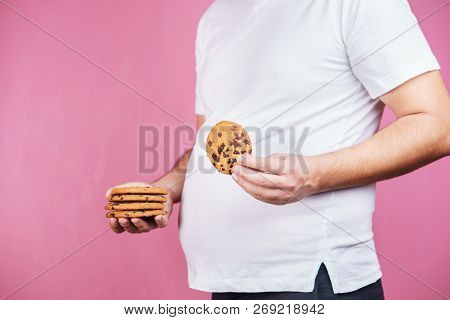 Overweight, Sugar Addiction, Imbalanced Ration, Eating Fast Food. Obese Glutton Man With Stack Of Ch