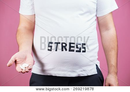 Stress, Mind Problems, Bulimia, Compulsive Overeating, Weight Gain. Overweight Man With Sedative Pil