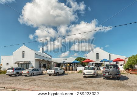 Paternoster, South Africa, August 21, 2018: A Street Scene, With A Restaurant, Antique Shop And Art 
