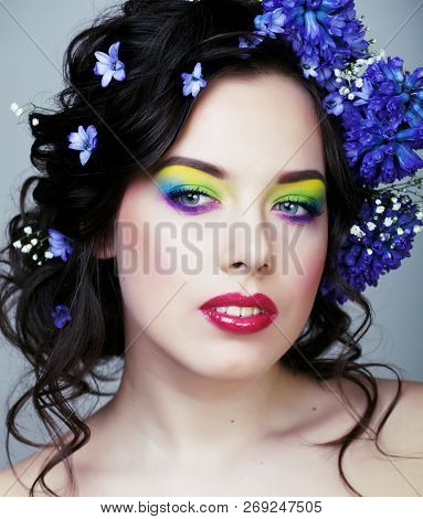 Beauty Young Woman With Flowers And Make Up Close Up, Real Sprin