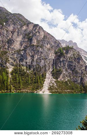 Mudflow With Snow High In The Alpine Mountains Lake, Lago Di Braies