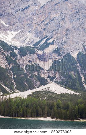 Mudflow With Snow High In The Alpine Mountains Lake, Lago Di Braies