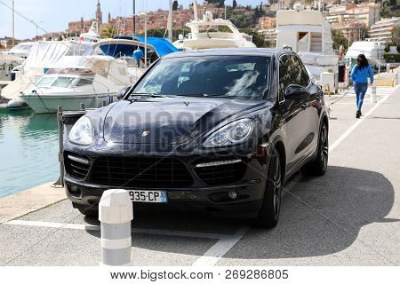 Menton, France - March 31, 2018: Luxury Porsche Cayenne Turbo Suv (front View) Parked On The Port Of