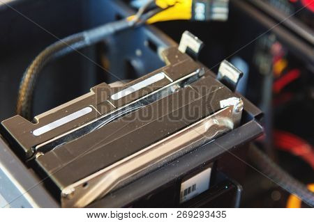 A Close-up Of Two Hard Drives Installed In A Metal System Unit Of A Home Personal Computer