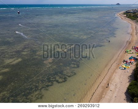 Phan Rang, Vietnam - 11 2018: Kiteboarding, Kite Surf. Extreme Sport Kitesurfing In Tropical Blue Oc