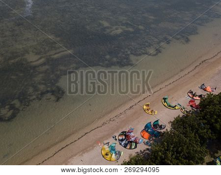 Phan Rang, Vietnam - 11 2018: Kiteboarding, Kite Surf. Extreme Sport Kitesurfing In Tropical Blue Oc