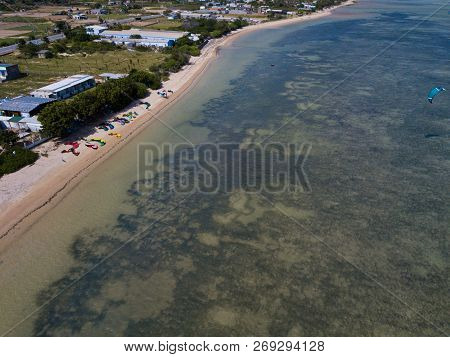 Phan Rang, Vietnam - 11 2018: Kiteboarding, Kite Surf. Extreme Sport Kitesurfing In Tropical Blue Oc