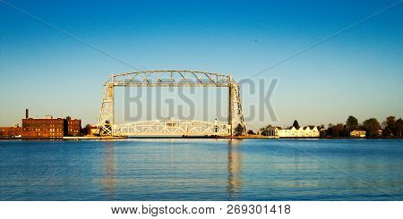 Duluth Minnesota Aerial Lift Bridge In Late Afternoon From Harbor On Sunny Day