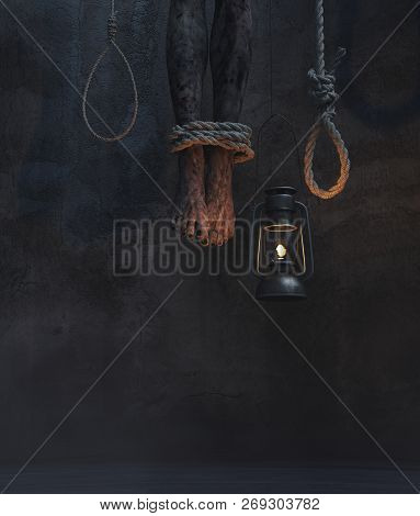 Legs Of Dead Body Hanging In A Dark Room With Hanging Lantern And Rope Noose,3d Illustration