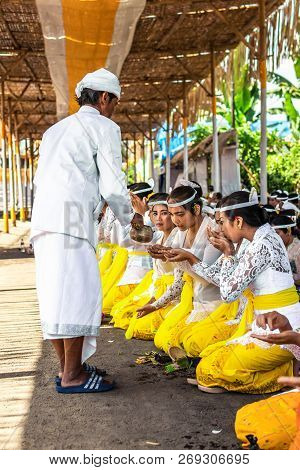 Bali, Indonesia - October 9, 2018: Holyman On A Traitional Balinese Hindu Ceremony In Ubud.