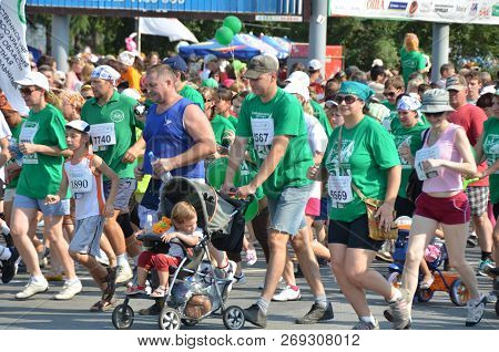 Omsk, Russia - August 12: Marathon Runners In Action At The Siberian International Marathon On Augus