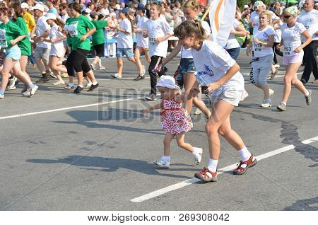 Omsk, Russia - August 12: Marathon Runners In Action At The Siberian International Marathon On Augus