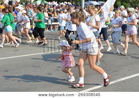 Omsk, Russia - August 12: Marathon Runners In Action At The Siberian International Marathon On Augus