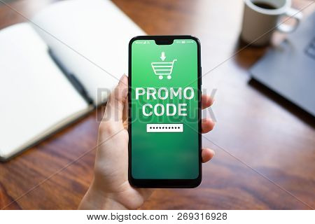 Promo Code Discount Coupon Number Field On Mobile Phone Screen. Business And Marketing Concept.