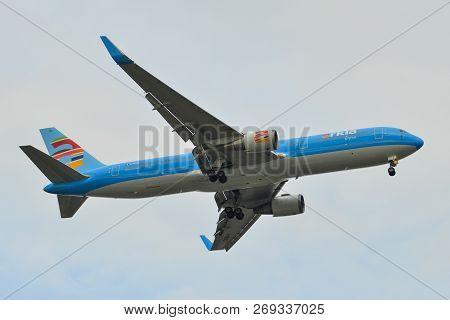 Passenger Airplane Landing At The Airport