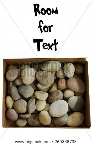 Box of Rocks. Bad Boys and Girls get a Box of Rocks for Christmas. Isolated on white. Room for text. Round River Rocks in a Cardboard Box on a white background. Dumber than a Box of Rocks. 