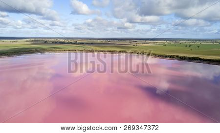 Clouds Reflecting In Pink Lake Aerial Photo