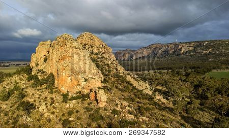 Cliff In Forest At Sunset Aerial Photo