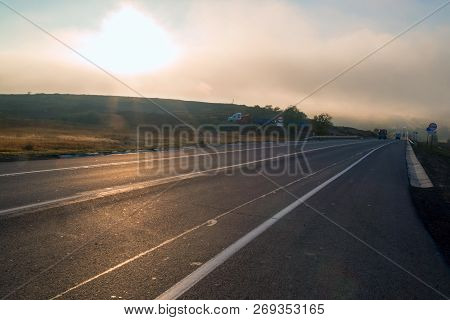 Route A-270 In The Area Of Novoshakhtinsk In The Early Morning In The Fog.