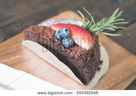 Closeup Chocalate Cake With Strawberry And Blueberry