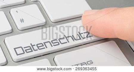 A Keyboard With A Button Labled With The German Word Datenschutz (data Protection)