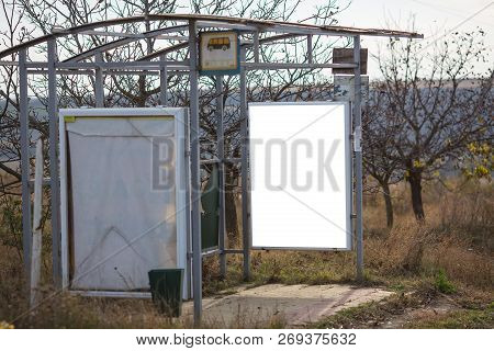 Vertical Billboard Mockup On Bus Stop In Village