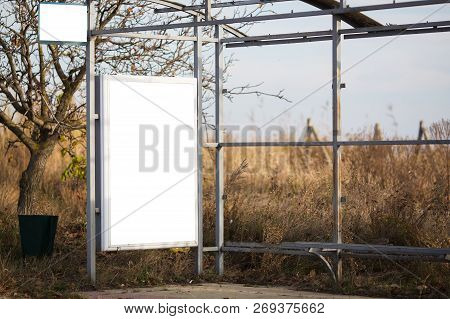 Billboard Mockup On Bus Stop In Village
