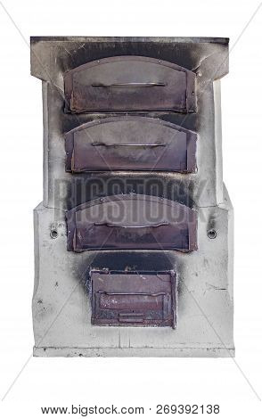 Front Side Of A Historic Oven In White Back