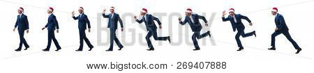 Young busnessman wearing santa hat in christmas concept on white