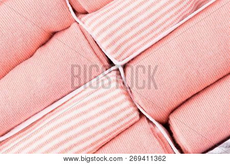 Socks Organizer With Peach Color Socks. Top View