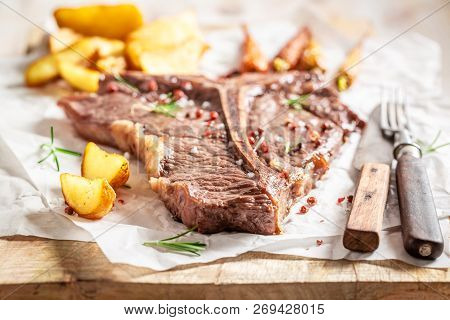 Yummy Tbone Steak With Potatoes And Roasted Vegetables