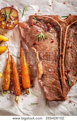 Homemade Tbone Steak With Potatoes And Roasted Vegetables