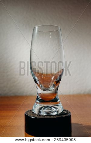 Dirty Glass Of Smusy With The Superheated Grounds On A White Background