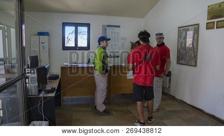 Aconcagua, Mendoza / Argentina, February 14 2014: Tourists Inside The Administrative Office Of The A