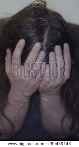 Mental Health Psychosis And Depression Photo. Close-up Hands Shrink From Nerves. Toning, Low Key, Se