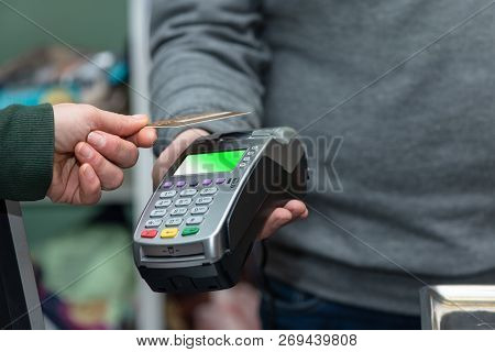 Nfc Technology, Customer Do Payment With Contactless Credit Card. Credit Card Reader Implements Paym