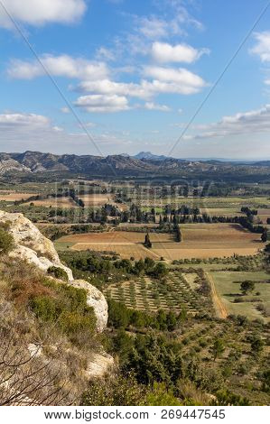 The Valley Between Les Baux De Provence And The Alpilles Mountains Are Dotted With Farms