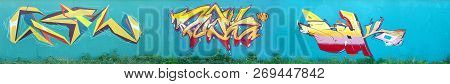 Full And Acomplished Graffiti Artwork. The Old Wall Decorated With Paint Stains In The Style Of Stre