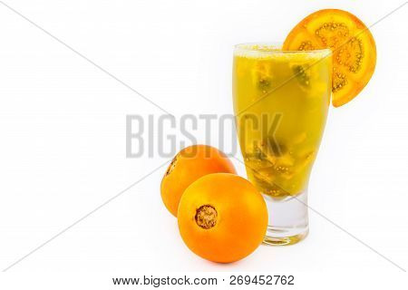 Traditional Colombian Beverage Made Of Juice And Pieces Of Lulo (solanum Quitoense) Called Lulada