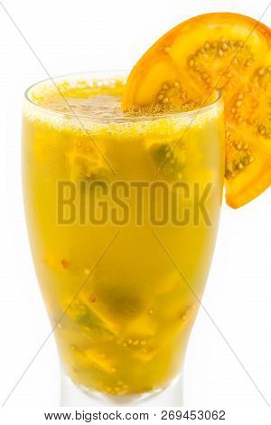 Traditional Colombian Beverage Made Of Juice And Pieces Of Lulo (solanum Quitoense) Called Lulada