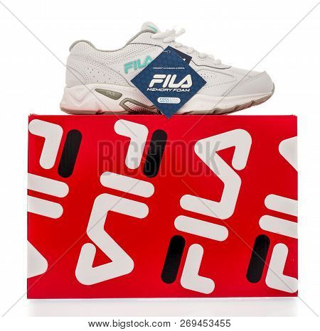 Winneconne, Wi - 30 October 2018: A Fila Shoebox With A Fila Shoe Sitting On Top Of It On An Isolate