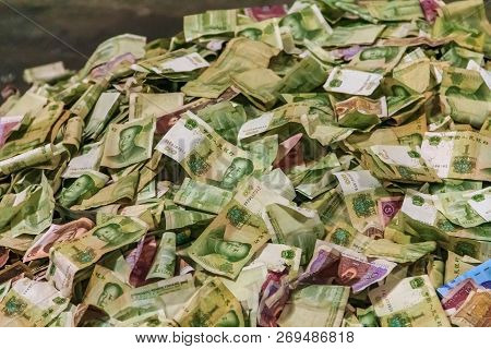 Money On An Imperial Grave At Ming Dynasty Imperial Tombs, Built By The Emperors Of The Ming Dynasty