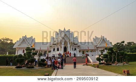 Lumbini, Nepal - November 10 2018: People And Tourists Admiring Rotal Thai Monastery Of Lumbini.