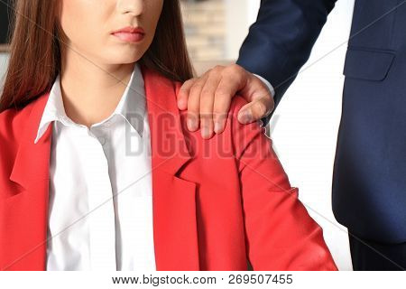 Boss Molesting His Female Secretary In Office, Closeup. Sexual Harassment At Work