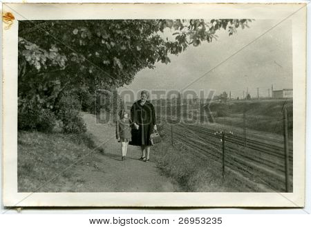 Vintage photo of mother and daughter (lately fifties)