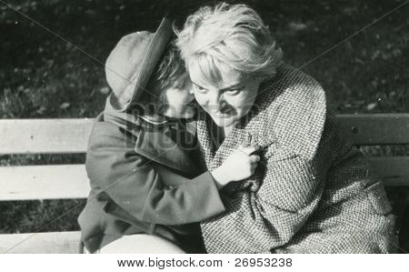 Vintage photo of mother and daughter (lately fifties)