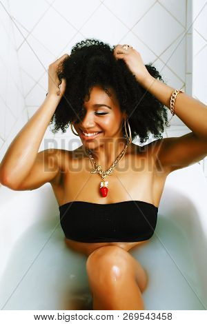 Young Pretty African American Girl Taking Bath With Foam, Lifest