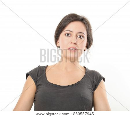 Brunette Woman Looks In Amazement, Isolated On White